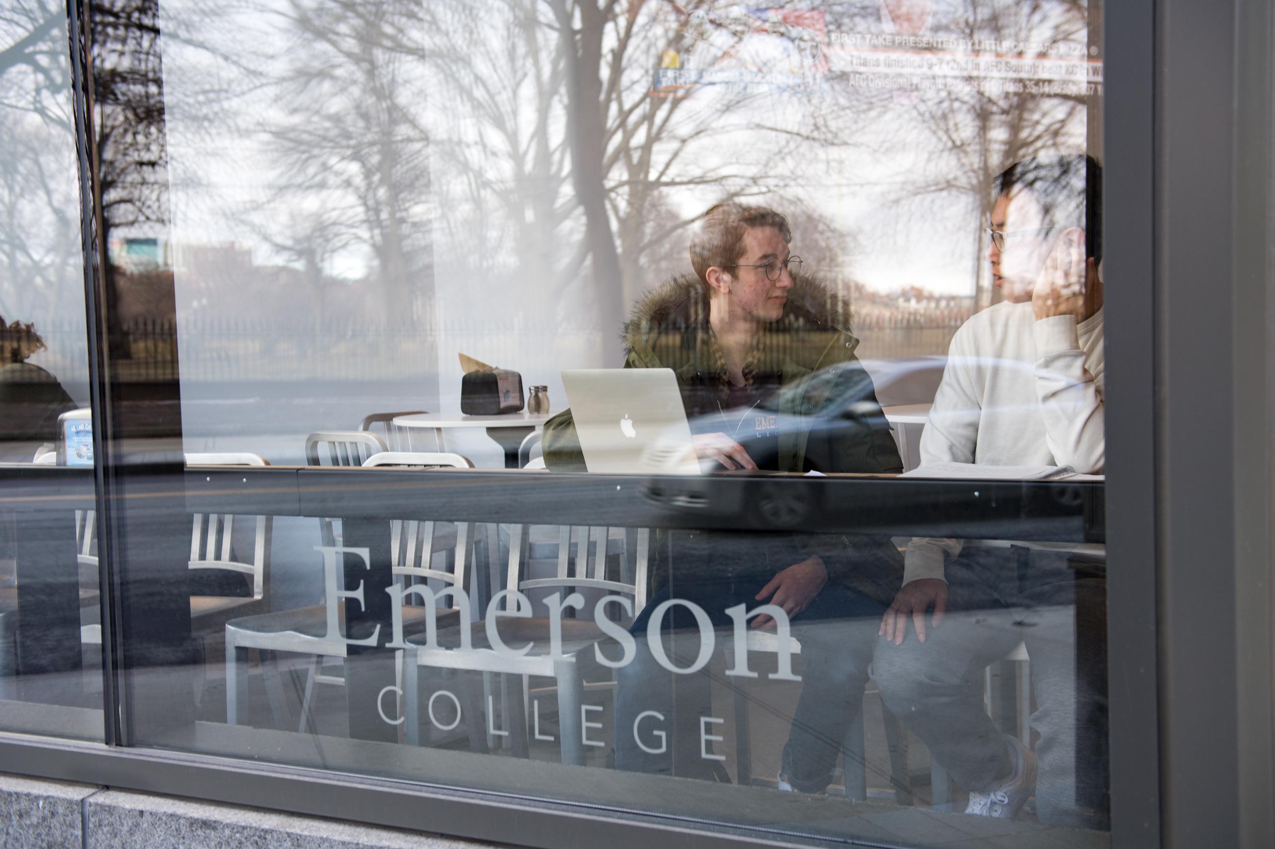 People working on a laptop in Emerson’s Dining Center