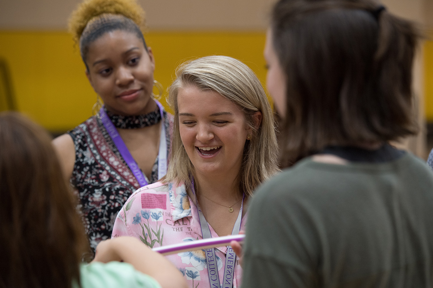 Smiling undergraduate student at an Admissions event